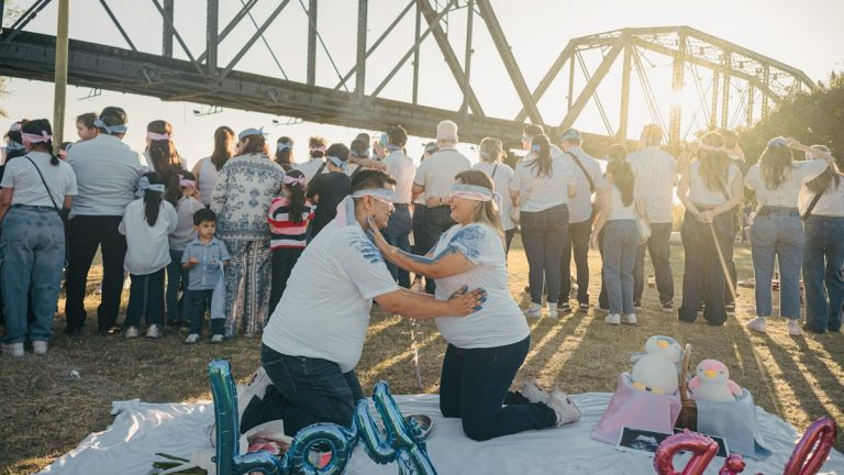 Couple guesses gender during outdoor baby shower event